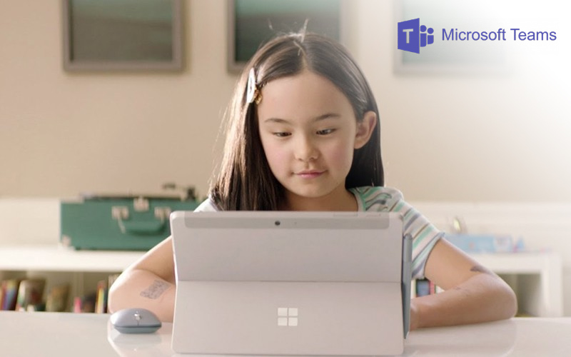 Girl working on Surface Studio device