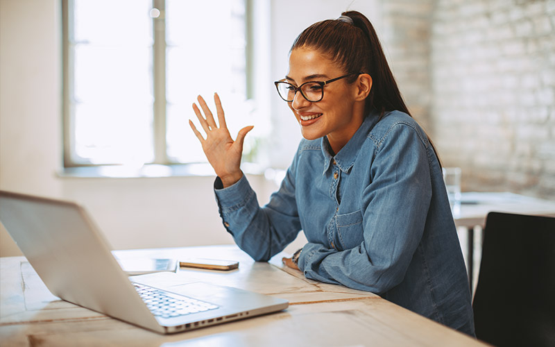 Woman running a meeting via video call