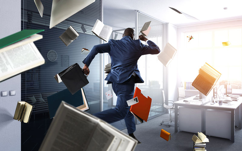 Man running through an office