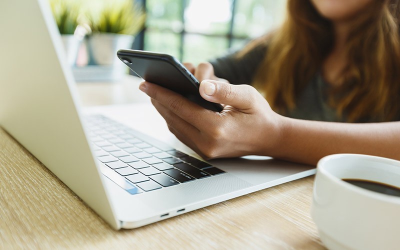 Give people the power to work the way they want Woman working on a MacBook